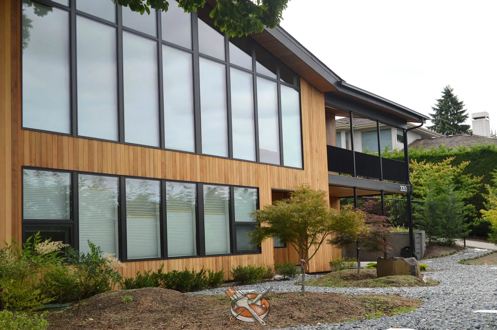 Exterior cedar finish by Hedlund Painting on a modern home in Clyde Hill, WA