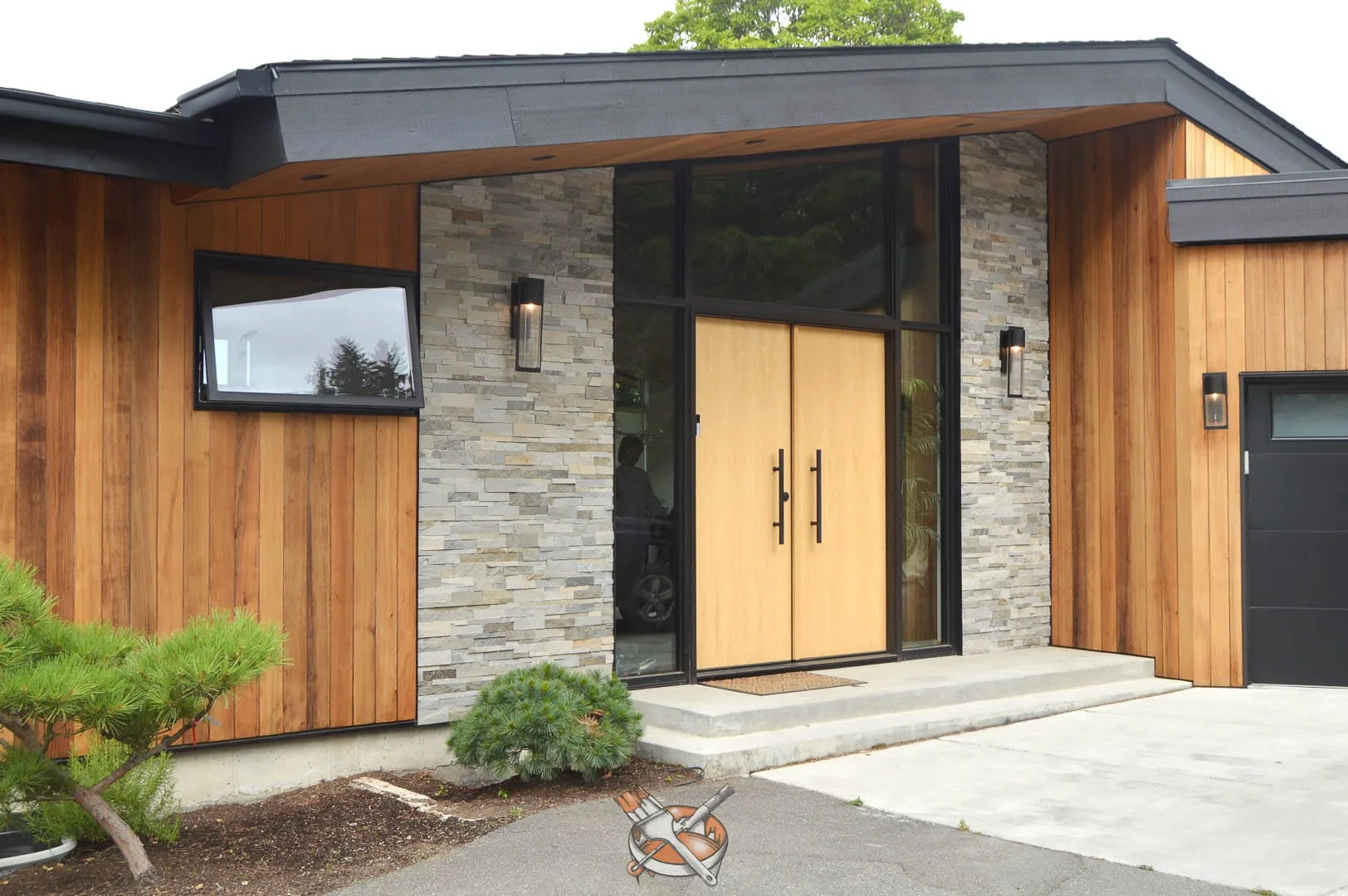 Exterior cedar finish by Hedlund Painting on a modern home in Clyde Hill, WA