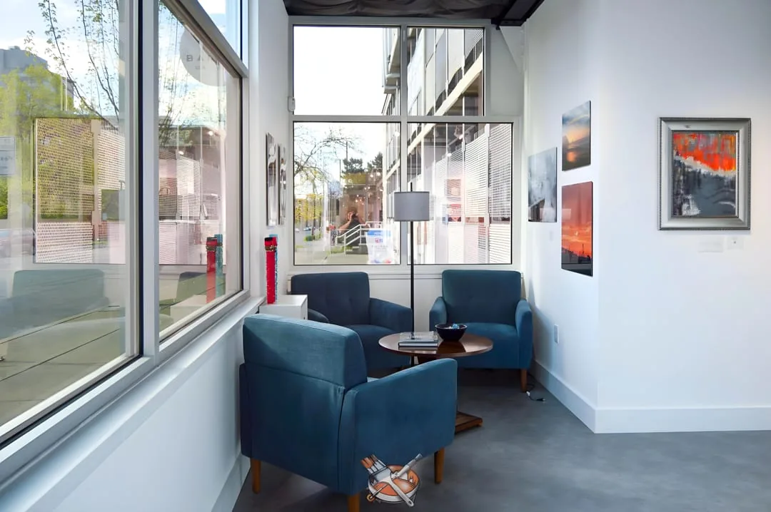 Gallery display wall repaint by Hedlund Painting, Seattle commercial interior